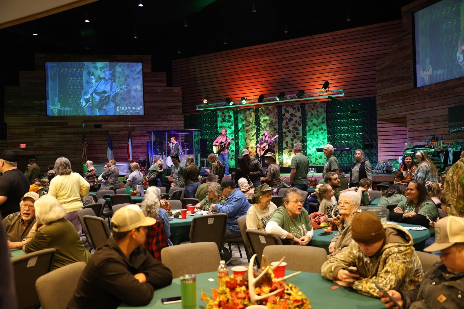 Camo Sunday guests enjoying food and fellowship