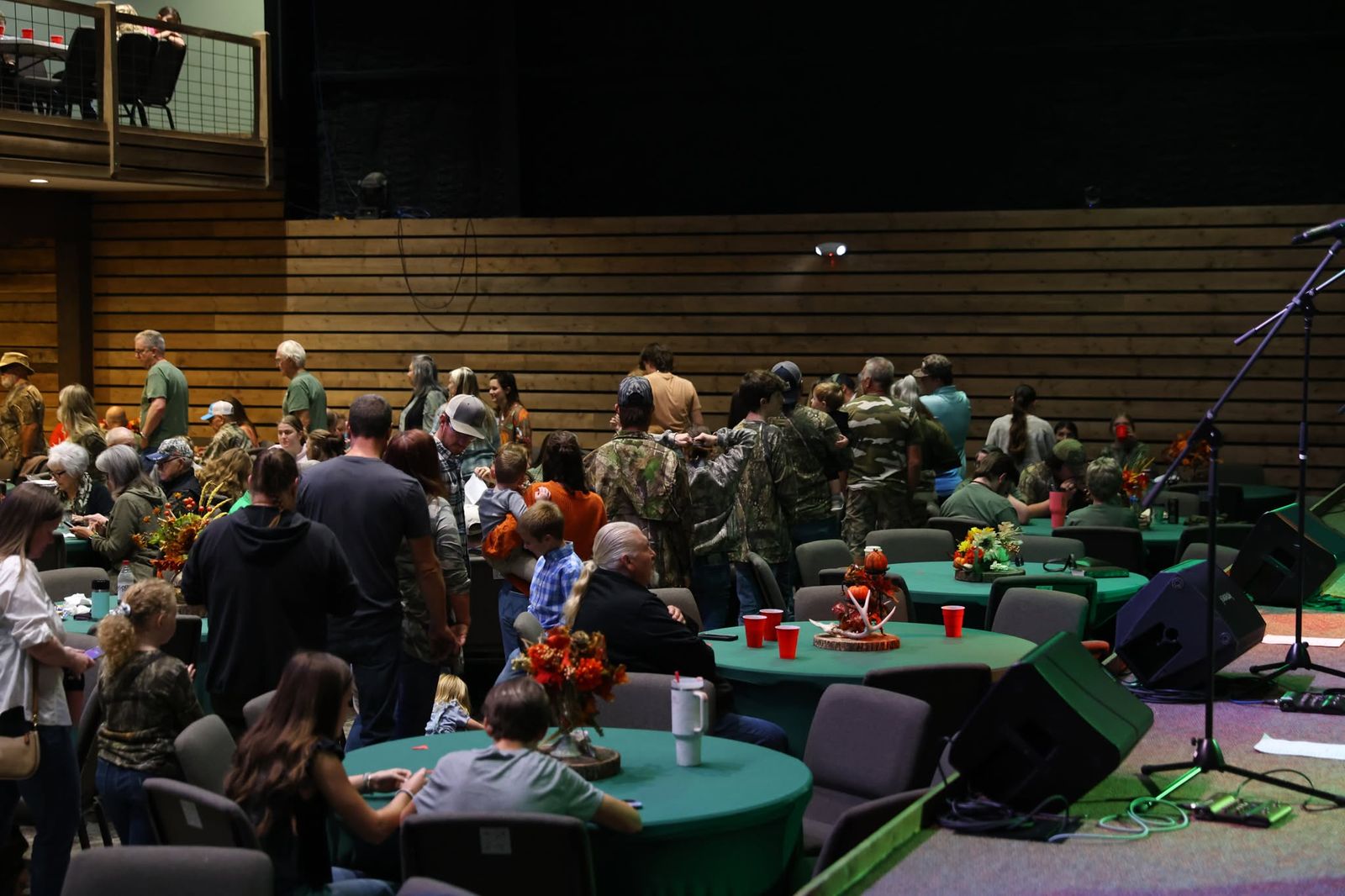 Camo Sunday families, guests and friends together